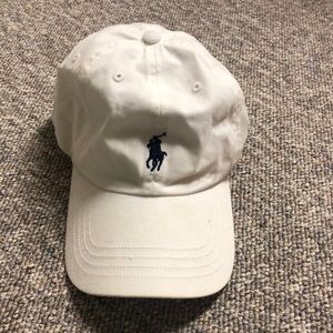 White and navy polo hat